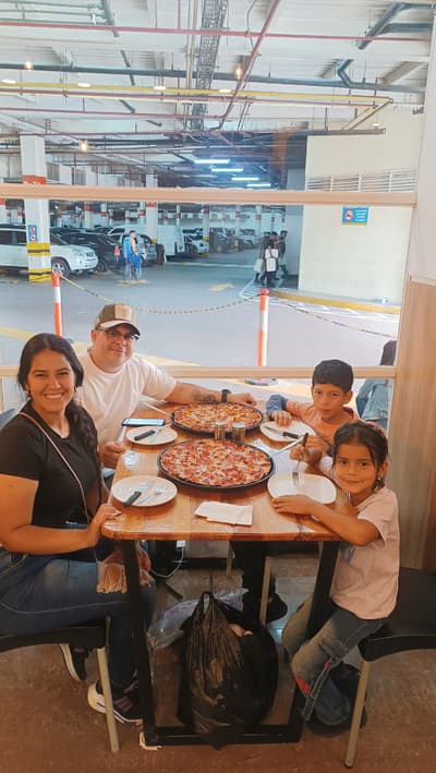Enjoying a delicious pizza with my children and wife🍕🍕💕